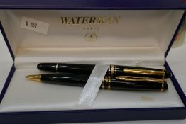 Mont Blanc; a Meisterstuck Fountain pen, a similar ballpoint pen (Waterman) and a Mont Blanc ink bot