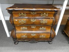 An antique French burr walnut Bombe chest having 4 long drawers on bun feet 93cm