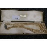 Antique triple strand pearl necklace and two modern silver clasped simulated pearl extender