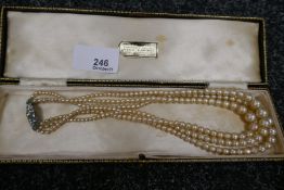 Antique triple strand pearl necklace and two modern silver clasped simulated pearl extender