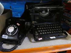 Vintage Remington Standard typewriter Stamped No 12. Plus Vintage black phone withdrawer.