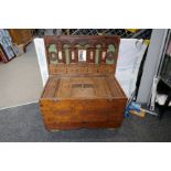 An old Burmese marriage cabinet chest having fitted interior with carved decoration
