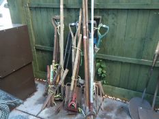 Large collection of vintage garden tools to include shears, forks, pickaxe, etc