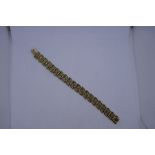 9ct yellow gold bracelet, of intricate design, marked 375, 19cm, 31.5g approx