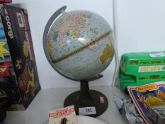 A vintage Danish globe made in Denmark, with a Bakelite base made by Havdrup, height 23cms