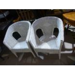 Pair of white Lloyd Loom style armchairs