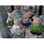 Set of Wade Nat West pigs including 'The Cousin'.