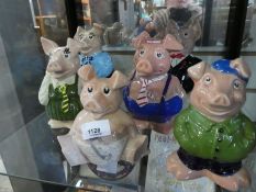 Set of Wade Nat West pigs including 'The Cousin'.