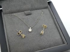 Pretty boxed 9ct White gold necklace hung with a diamond pendant approx 0.10pts diamonds and a pair