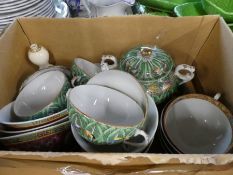 A box of Oriental cups, saucers and similar