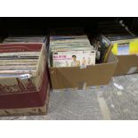 Four boxes of vinyl LP records including Elvis and Kitty Wells