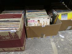 Four boxes of vinyl LP records including Elvis and Kitty Wells