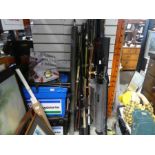 A large quantity of fishing rods, two tackle boxes and sundry