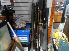 A large quantity of fishing rods, two tackle boxes and sundry