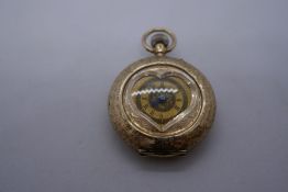 9ct yellow gold ladies Fob watch with heart shaped dial, with 9ct dustcover and case 152702, the rev