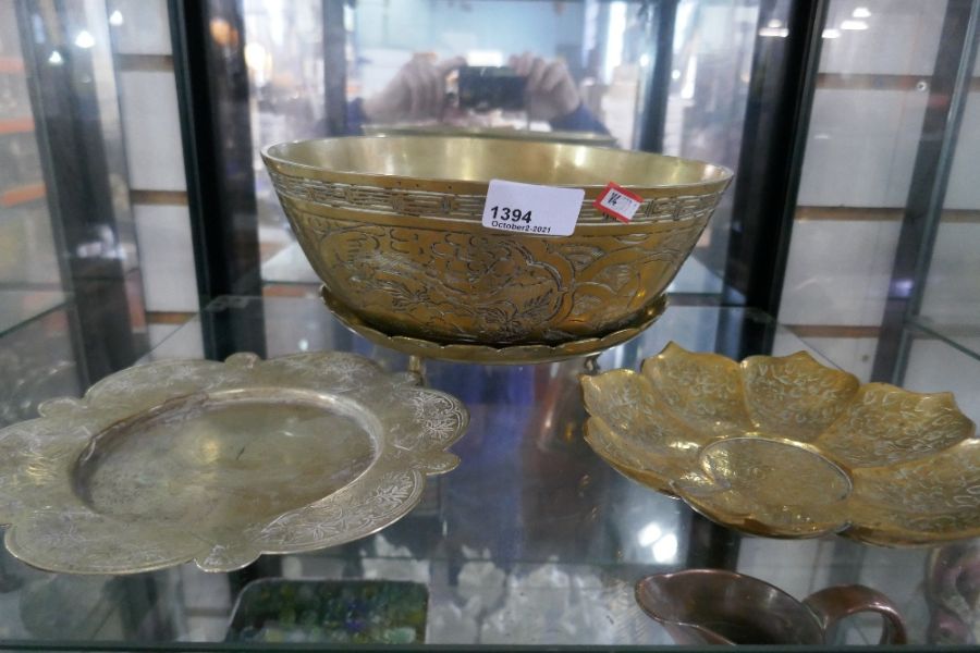 A Chinese brass bowl with engraved decoration and sundry metalware