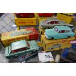 Three Dinky vehicles in original boxes