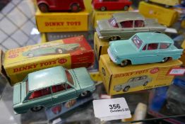 Three Dinky vehicles in original boxes