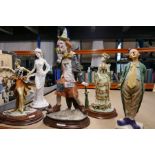 Five resin models of clowns, flapper girl, other ladies. Some Leonardo collection