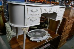 A vintage white paid kidney shaped dressing table, a pair of similar bedside chests and a stool