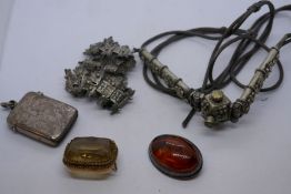 An Indian filligree white metal bracelet, an Indian necklace, small silver matchbox, and two brooche