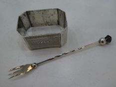 A small silver fork with a wrythen handle and amethyst, hallmarked Adie and Lovelen Ltd., Birmingham