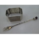 A small silver fork with a wrythen handle and amethyst, hallmarked Adie and Lovelen Ltd., Birmingham