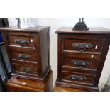 A pair of Indian hardwood three drawer bedside chests