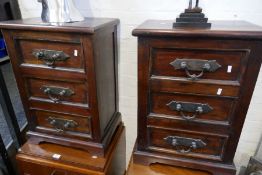 A pair of Indian hardwood three drawer bedside chests