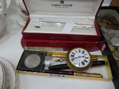 A small collection of collectables, including 14ct gold nibbed Parker pen, coins, a small brass case