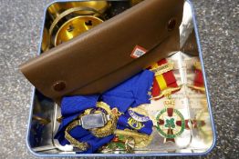 A tin containing Masonic medals, vintage watch, etc