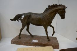 Gerrard McCabe a limited edition bronze figure of running stallion on oblong marble base, 3/20, leng