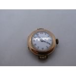 Antique, 9ct yellow gold watch marked 375 with white enamel dial, winds and ticks, 13.2g gross appro