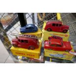 Four dinky vehicles (some repro boxes)