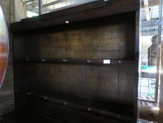 Period oak dresser with open rack above drawers and cupboards