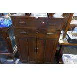 A 1930's oak cupboard with two drawers