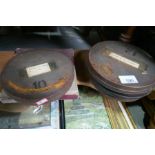 Five old movie reels and a quantity of pictures