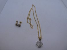 Pretty 9ct yellow gold necklace and earring set, necklace hung with diamond cluster pendant hung 9ct