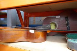 Two vintage acoustic guitars - one Angelica and an Almeria