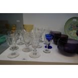 A quantity of antique clear and coloured glass ware, including 3 finger bowls