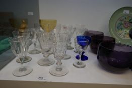 A quantity of antique clear and coloured glass ware, including 3 finger bowls