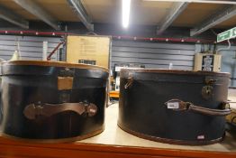 Two vintage leather bound hat boxes