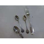 Silver flatware to include three silver soons and a large heavy Victorian silver fork. Fork hallmark