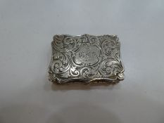 A high quality Victorian antique Vinaigrette, of shaped rectangular form, with scroll edge and engra