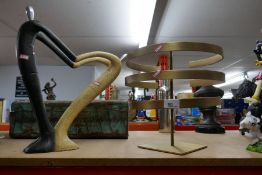 Contemporary art figure and a brushed brass center piece