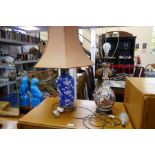 Two Chinese converted table lamps, one having blue and white decoration