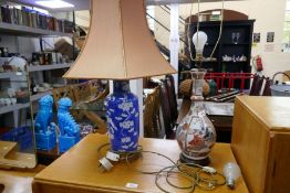 Two Chinese converted table lamps, one having blue and white decoration