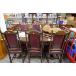 A reproduction Oak draw leaf refectory table with a set of 6 oak dining chairs, the table extended 2