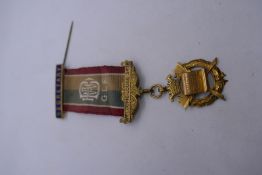 9ct yellow gold masonic medal inscribed 'Presented Bro S.Applegate' Secretary - Welcome Lodge hallma