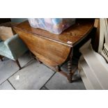 Oak oval gateleg dining table, mahogany D- end table, oak gateleg coffee table, and a green upholste